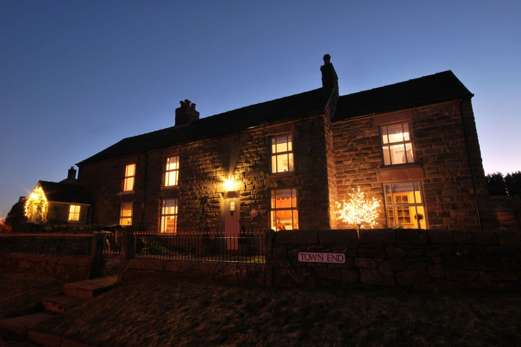 dannah cottages at night