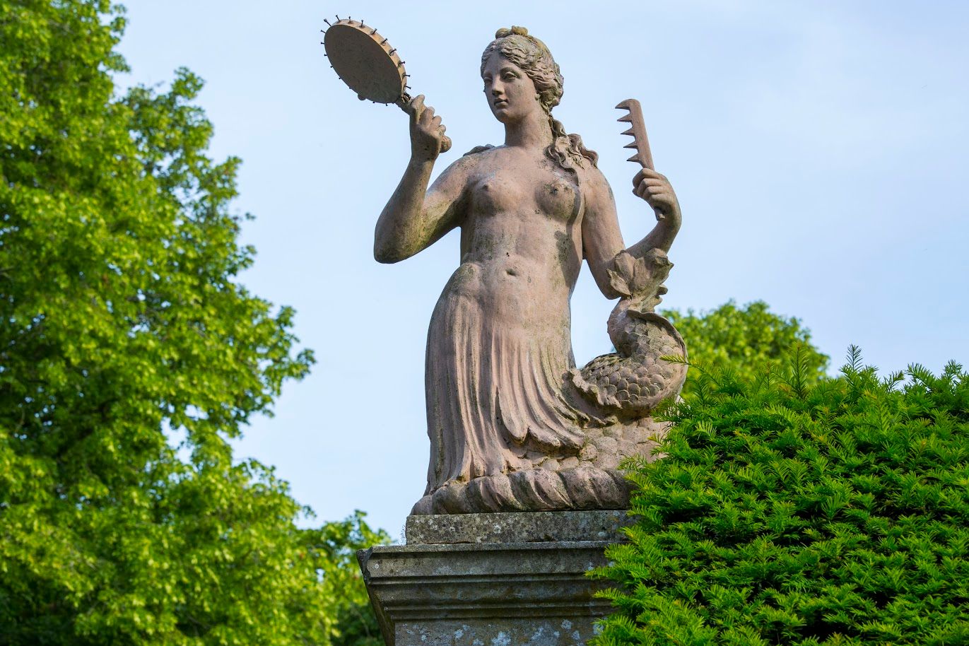 Farleigh House gardens statue Mermaid close up